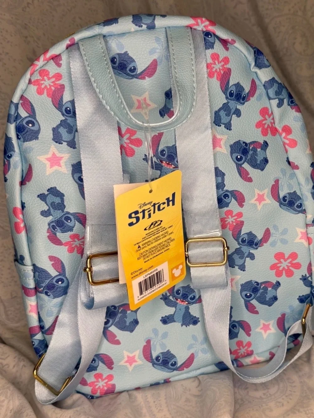 Disney Stitch Light Blue Mini Backpack with Pink Flower & Star Accents